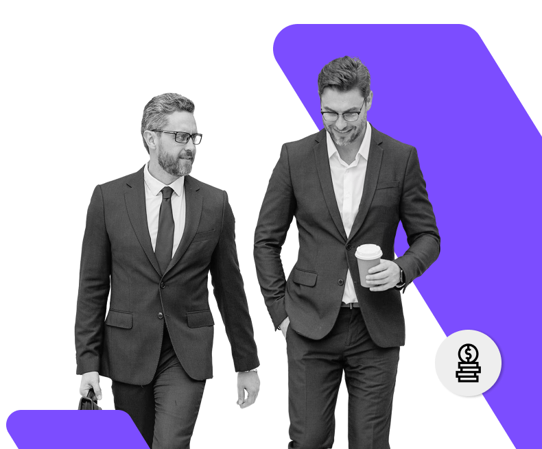 Two business professionals walking together, symbolising WIUS Capital’s partnership approach to delivering tailored investment solutions
